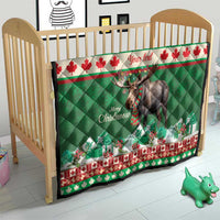 Personalized Christmas moose quilt on a toddler bed/crib, green quilt with moose and red border