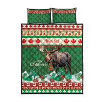 Christmas quilt bed set with moose graphic, red-and-white leaf trim, flat lay with pillows