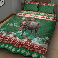 Green quilt bed set with moose on snowflake and holly pattern, two pillows