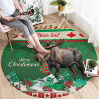Round Christmas carpet in green with moose wearing plaid scarf and 'Your text' banner