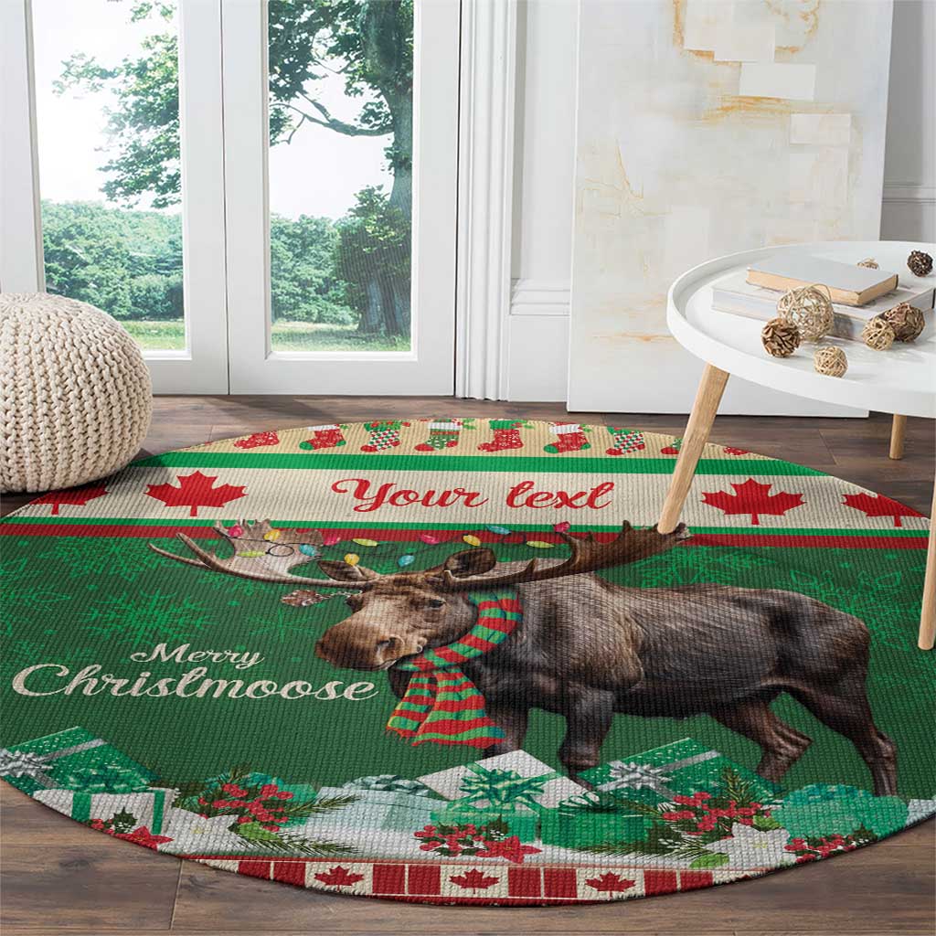 Round Christmas carpet in green with moose on front, striped scarf, and red snowflake accents