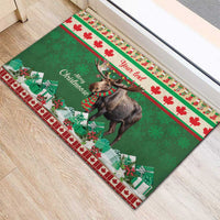 Green rubber doormat with moose portrait, snowflakes, and 'Merry Christmoose' text