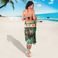 Green Christmas moose sarong, 'Your text' ribbon and red-white patterned hem