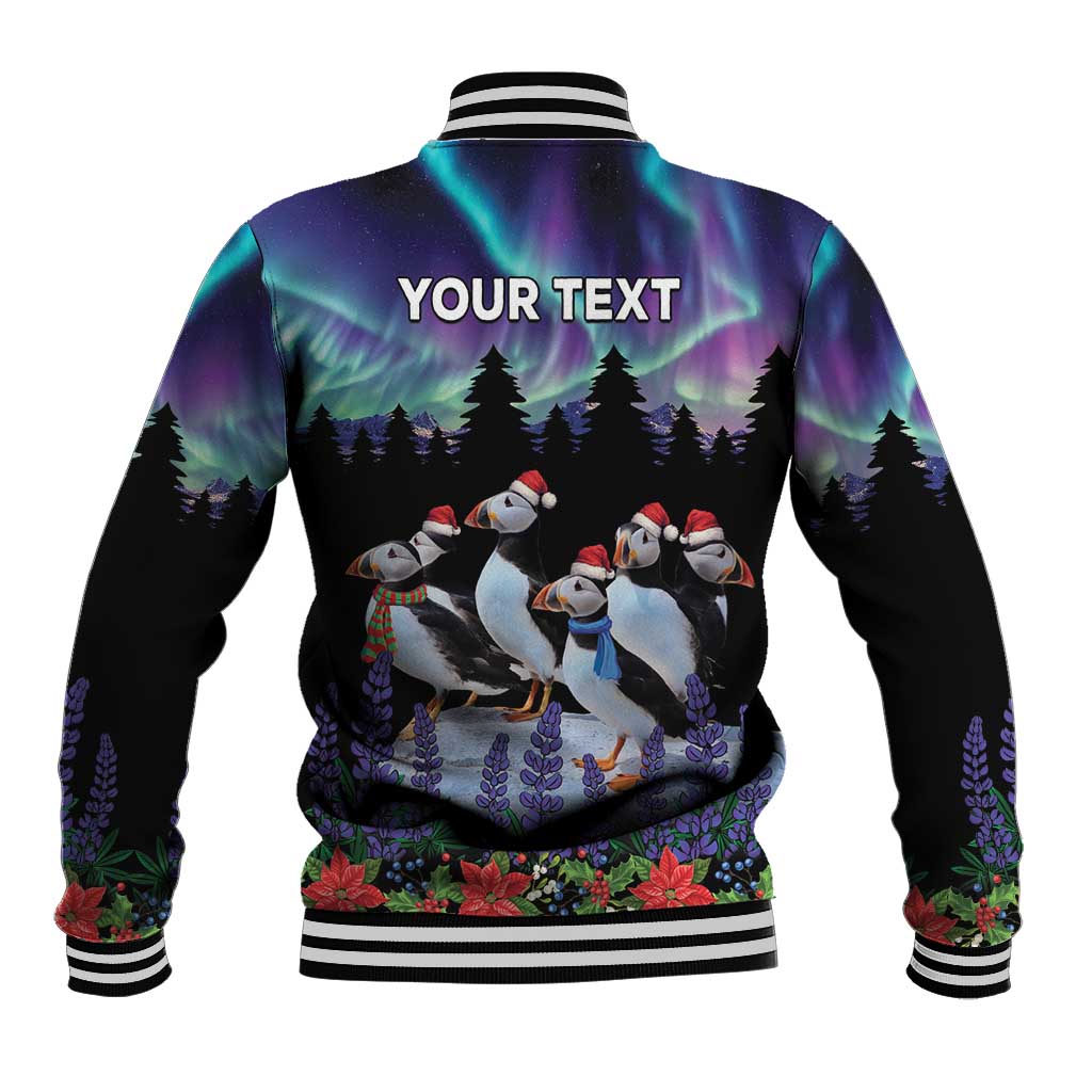 Black unisex varsity jacket with puffin winter scene and "YOUR TEXT" on the back