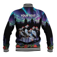 Black unisex varsity jacket with puffin winter scene and "YOUR TEXT" on the back