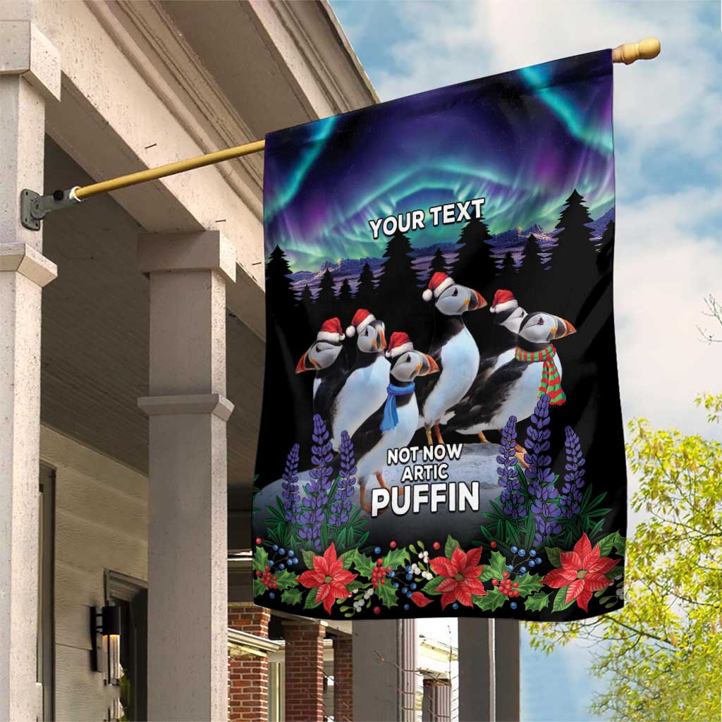 Personalized garden flag with puffins, aurora sky, flowers, and 'YOUR TEXT' header