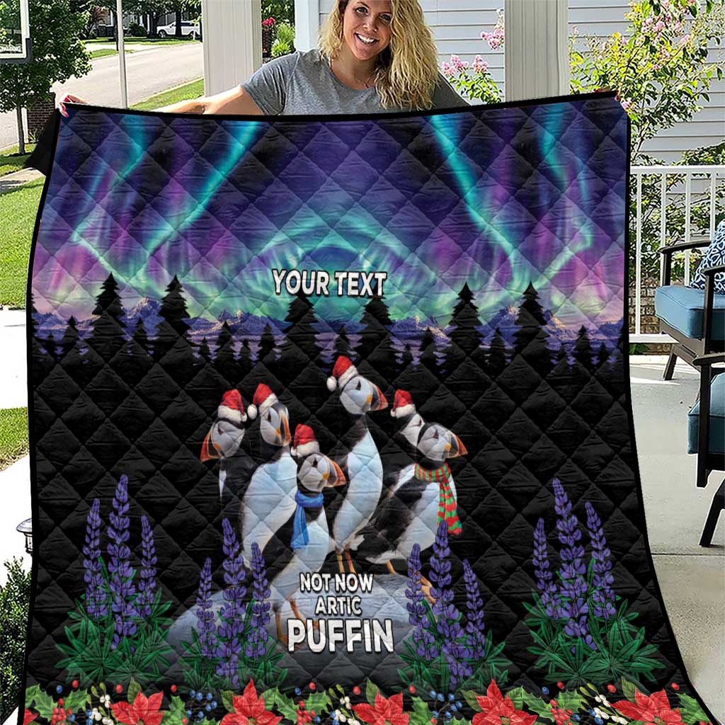 Black quilt with northern lights aurora and arctic puffin applique, personalized text.