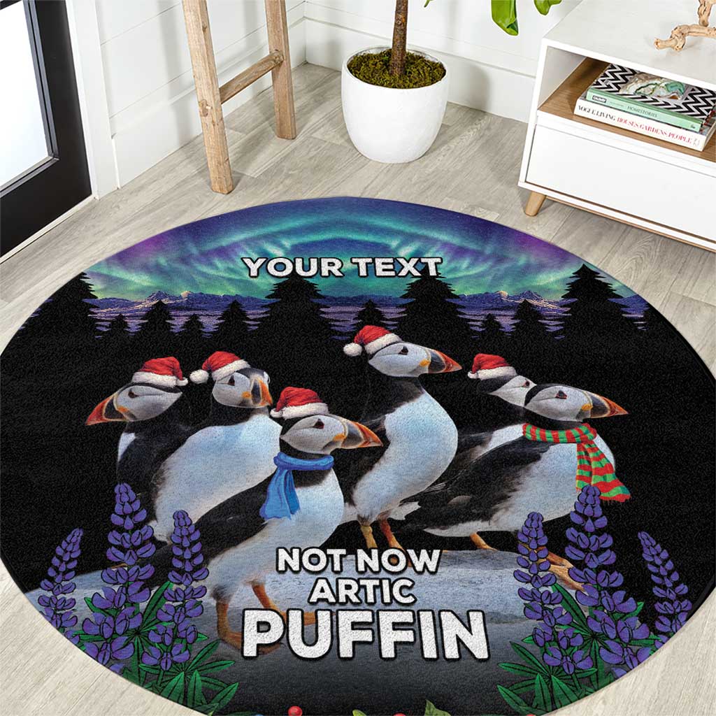 Black round decorative carpet with arctic puffins, purple flowers, and custom text