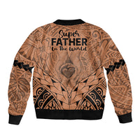 Tan Polynesian bomber jacket back, black rib hem, 'Super Father in the world' print