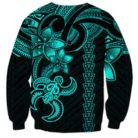 Dark sweatshirt with aqua tribal turtle graphic and patterned sleeves, crewneck