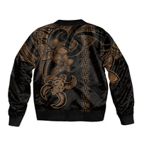 Black bomber jacket back with gold Polynesian tribal print and turtle motif, ribbed cuffs