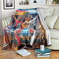 Blue football blanket draped over couch with '00 YOUR TEXT' and cartoon players