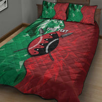 Green and red quilted duvet bed set featuring lion shield graphic with two pillows