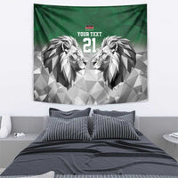 Green wall tapestry featuring geometric lion faces with "YOUR TEXT" and "21".