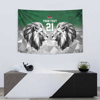 Green tapestry with geometric lion faces and centered "YOUR TEXT" with "21".