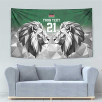 Green hanging tapestry showing geometric lion faces and "YOUR TEXT" above "21".