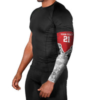 Red Kenya rugby arm sleeve with gray geometric camouflage band and Kenya logo