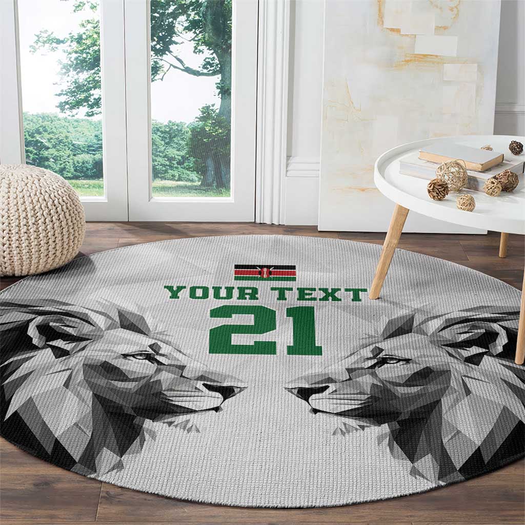 Round carpet with geometric lion faces, green YOUR TEXT 21 and dark outer border