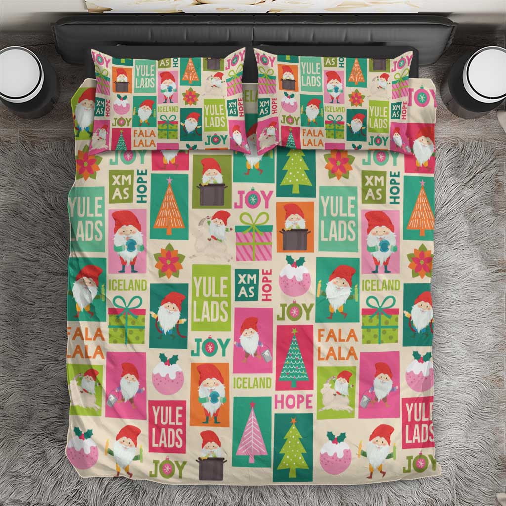 Christmas bedding set with multicolor patchwork pattern, Santa faces, trees, and gift icons