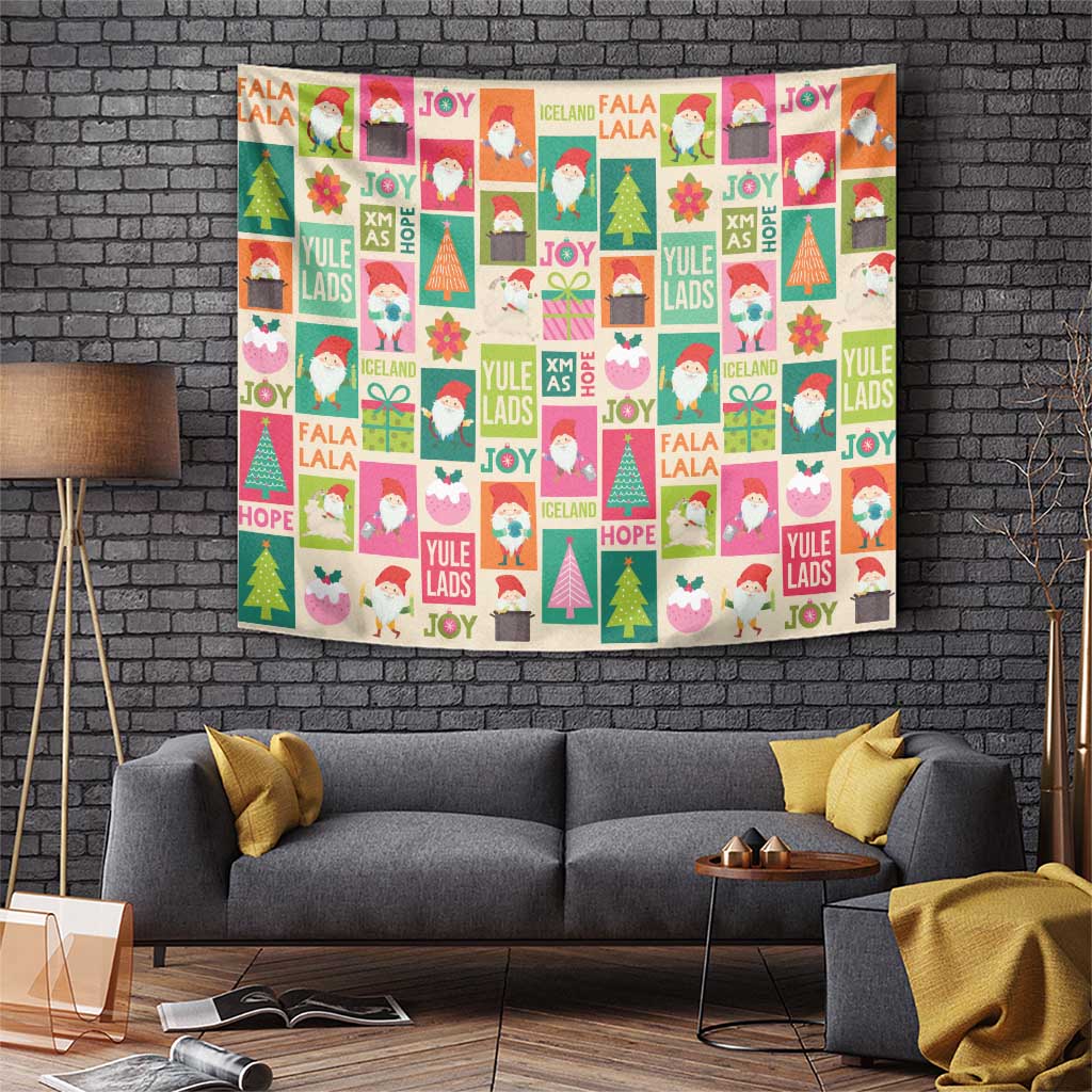 Colorful Christmas tapestry with Yule lads, trees, and JOY text on beige fabric.
