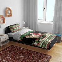 Green and black holiday bedding set on bed with goat and Santa, custom text panel