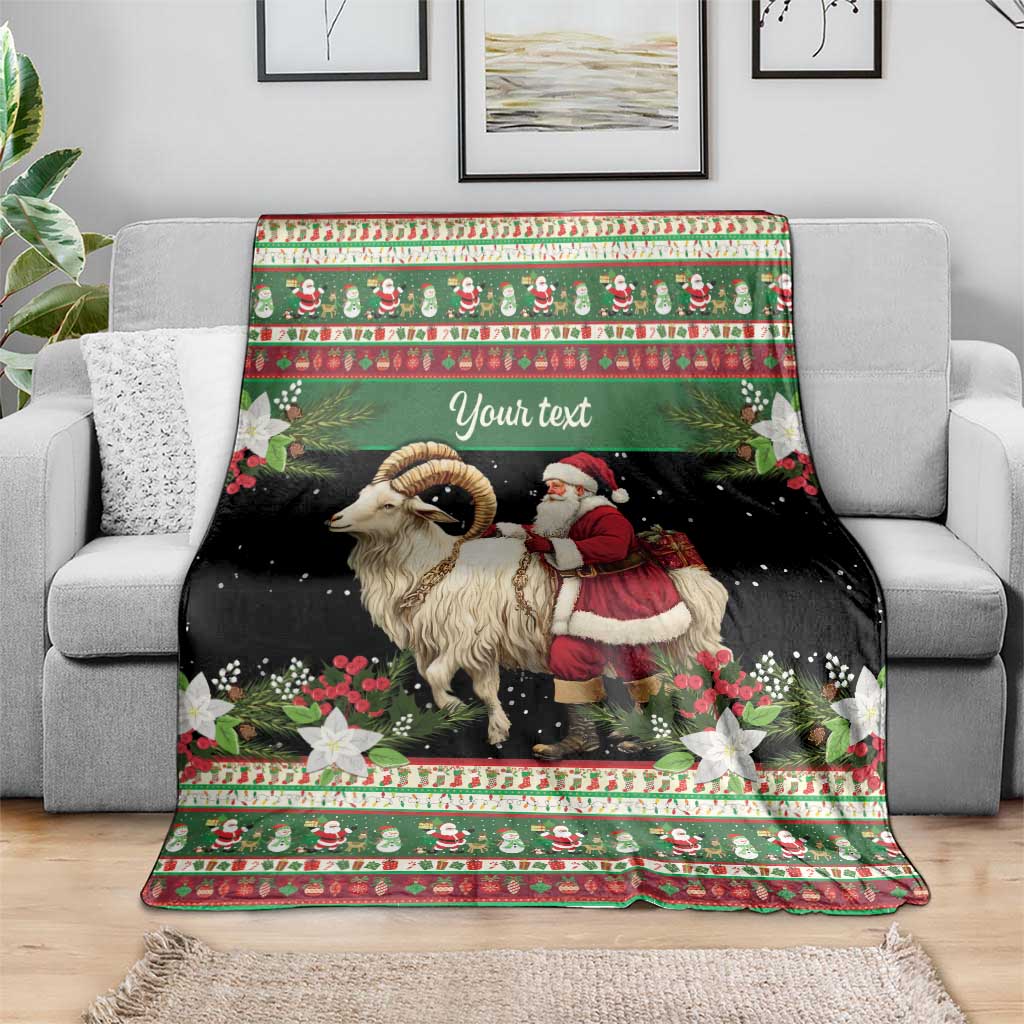 Personalized holiday throw blanket on sofa, green and black with goat and Santa artwork