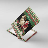 Angled green canvas wall art showing white goat and Santa, 'Your text'