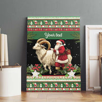 Green canvas wall art with white goat and Santa in red, 'Your text'