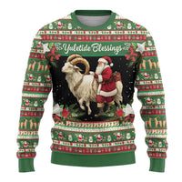 Green sweater front with goat and Santa graphic and “Yuletide Blessings” text, striped trim
