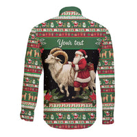 Green long sleeve button shirt with goat and Santa on back, 'Your text' banner
