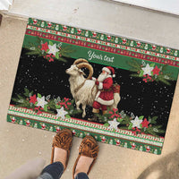 Green rubber doormat outdoors with goat and Santa, holiday border and custom text area