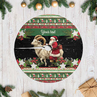 Round tree skirt with white fringe showing goat, Santa, and "Your text" on dark background