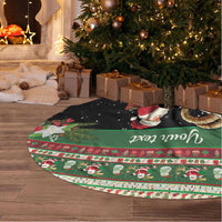 Personalized round tree skirt with festive green, black, and animal illustrations