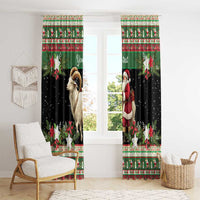 Pair of green and black holiday curtain panels with ram goat and Santa, festive striping