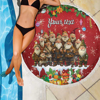 Red round beach blanket with fringe, gnomes and 'Your text' with gifts and candy details.