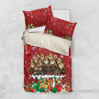 Red bedding set with duvet and two pillowcases, Santa-like characters and gift graphics