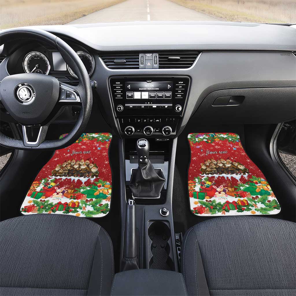Red holiday car floor mats with elves and gifts pattern and 'Your text' on front seats