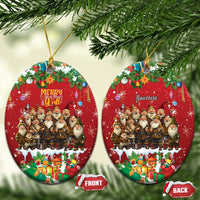 Red oval ceramic Christmas ornament with hanging loop, yule lads scene and holiday gifts