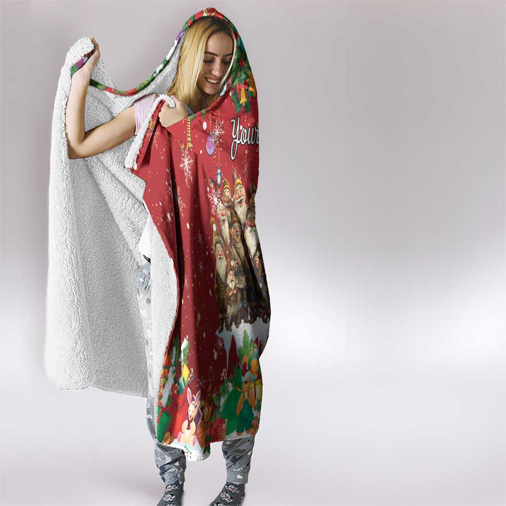 Red hooded blanket worn over clothes, with cozy sherpa lining and holiday print