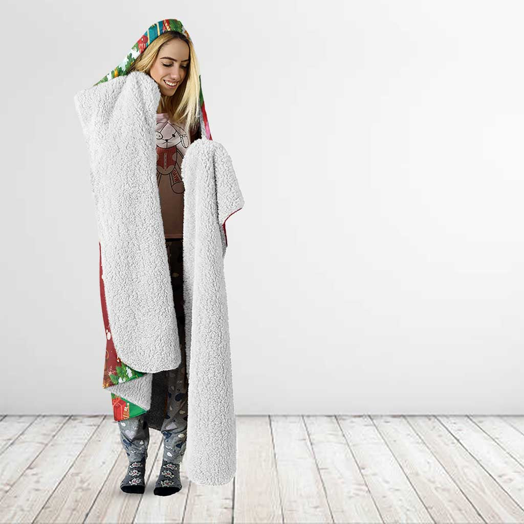 Red hooded blanket with full-length sherpa texture and colorful holiday hood