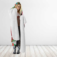 Red hooded blanket with full-length sherpa texture and colorful holiday hood