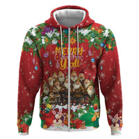 Red zip-up hoodie front with “Merry Christmas” scene featuring Santa group and gifts