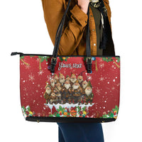 Red leather tote bag front view with black handles, zipper top, festive gnome scene and 'Your text'