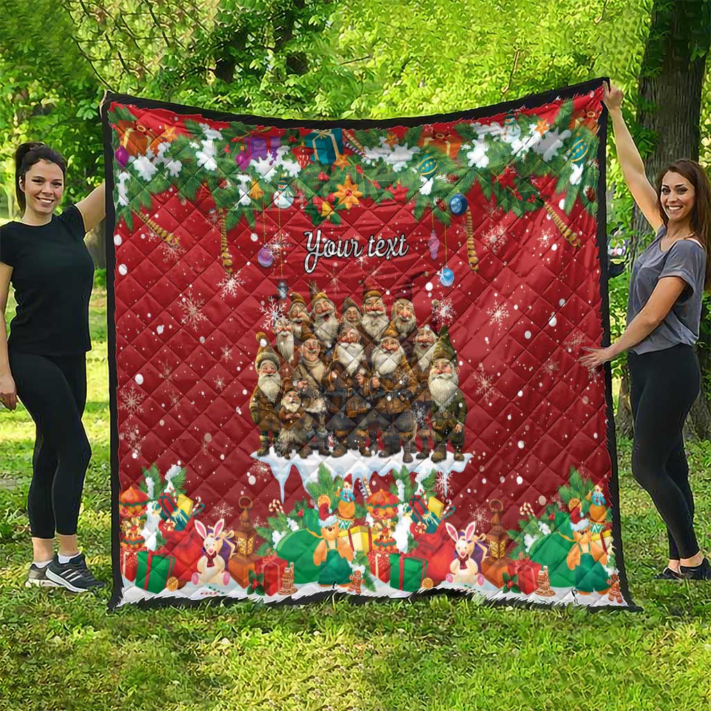 Red personalized quilt with "Your text", Yule characters, and holiday decorations.