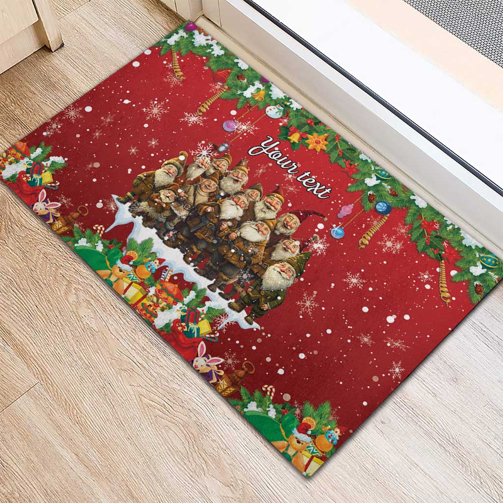 Red rubber doormat corner view with gnome group and 'Your text' script