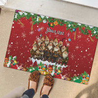 Red rubber doormat with gnome group, 'Your text', presents, and snowflakes