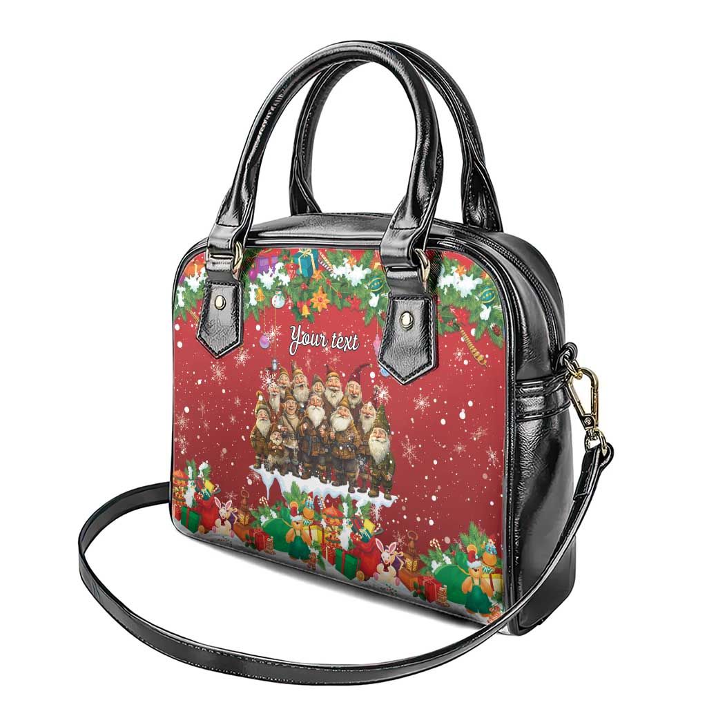 Red holiday handbag with black top handles and removable crossbody strap.