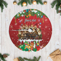 Red personalized Christmas tree skirt with white fringe edge and elf group round design