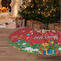 Red circular Christmas tree skirt with colorful holiday scene