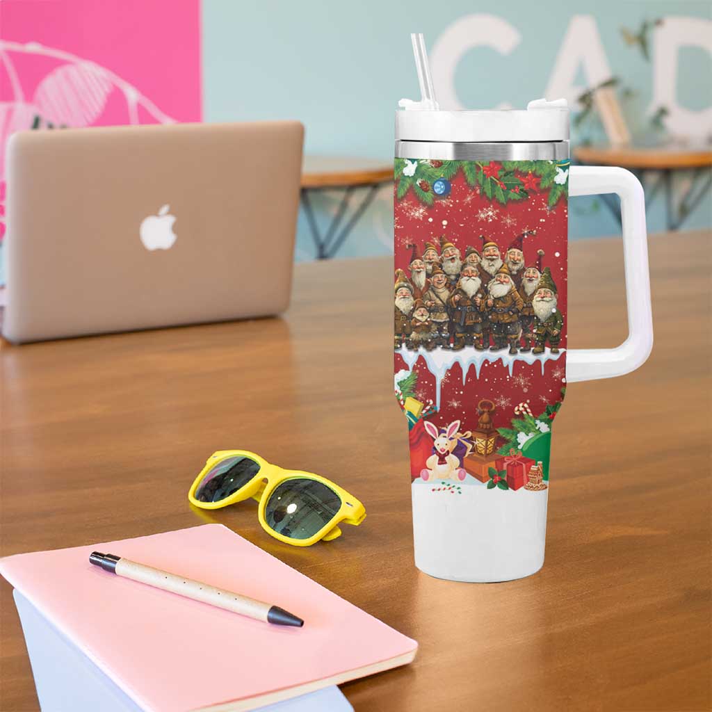 Red holiday tumbler with white handle and straw, festive character design on the cup